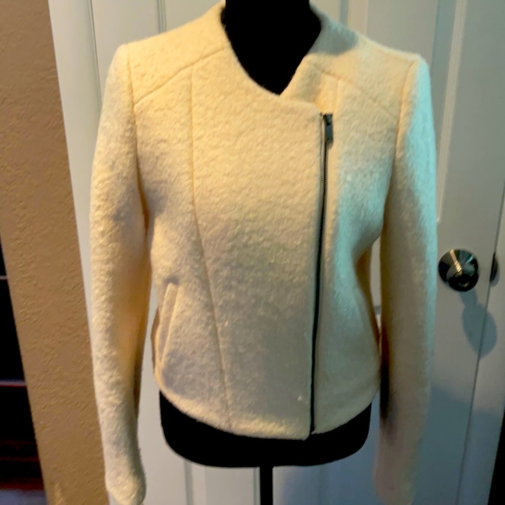 A woman’s jacket by banana republic size 10 color is winter white